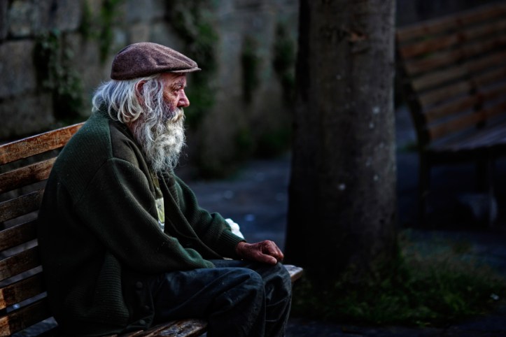 web-homeless-man-bench-sitting-staring-feans-cc